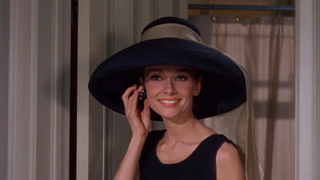 Audrey v klobouku